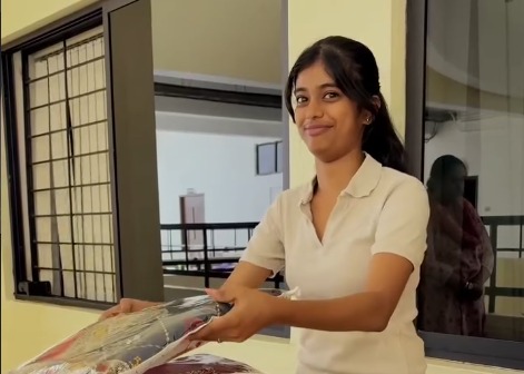 Mass communication student smiling during a campus activity at PES University Bengaluru