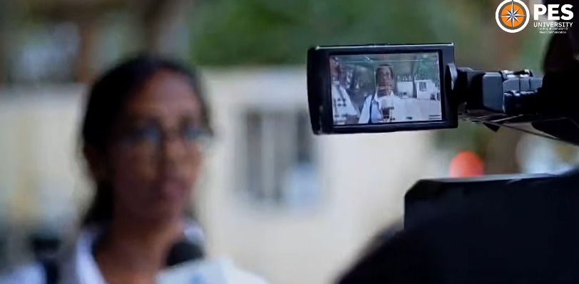 Camera monitor showing a field interview being recorded by journalism and mass communication students in Bengaluru