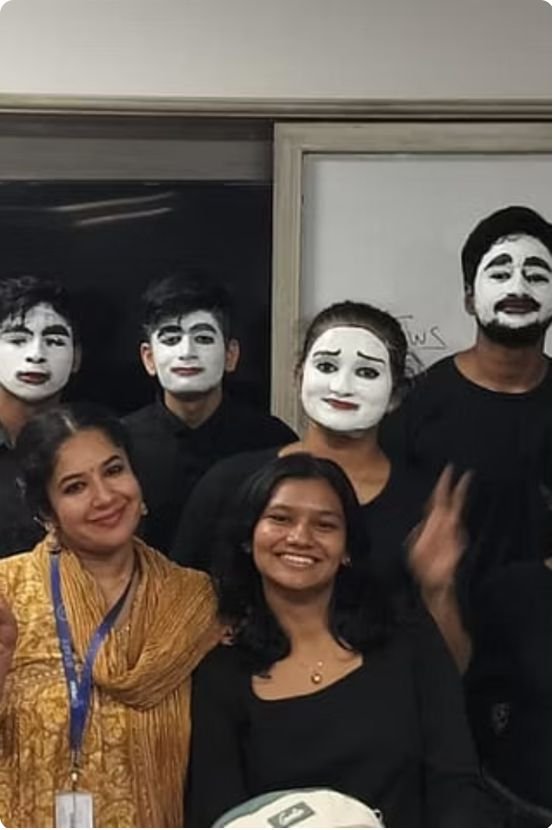 Journalism and mass communication students with mime face paint during a non-verbal communication workshop at PES University