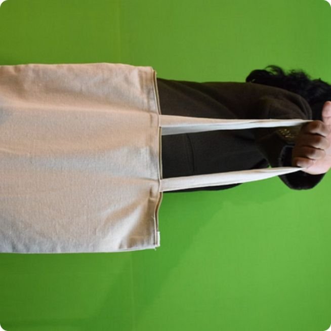 Product photography of a tote bag against a green screen during a student studio session at PES University